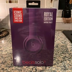 Beats solo2 over the ear headphones in purple.Brand new.